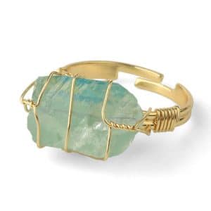 Capturing the essence of nature's beauty, this Green Fluorite crystal ring combines elegance with healing energy, promoting balance and growth while adorning your style with a touch of earthy sophistication.