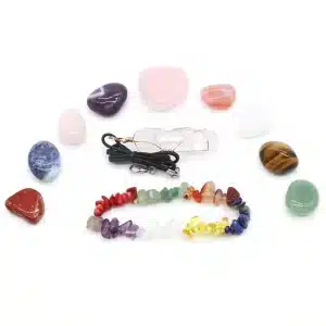The Chakra Stone Set, consisting of 11 healing crystals, a Chakras balancing bracelet, and a clear quartz pendant, serves to visually convey the holistic and harmonizing qualities of these natural gemstones, encouraging viewers to explore their potential for chakra balancing, energy alignment, and spiritual well-being.